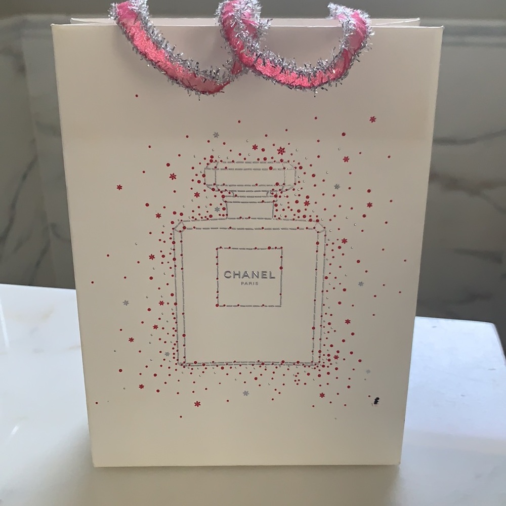 Chanel authentic shopping bag w/ beautiful ribbon.